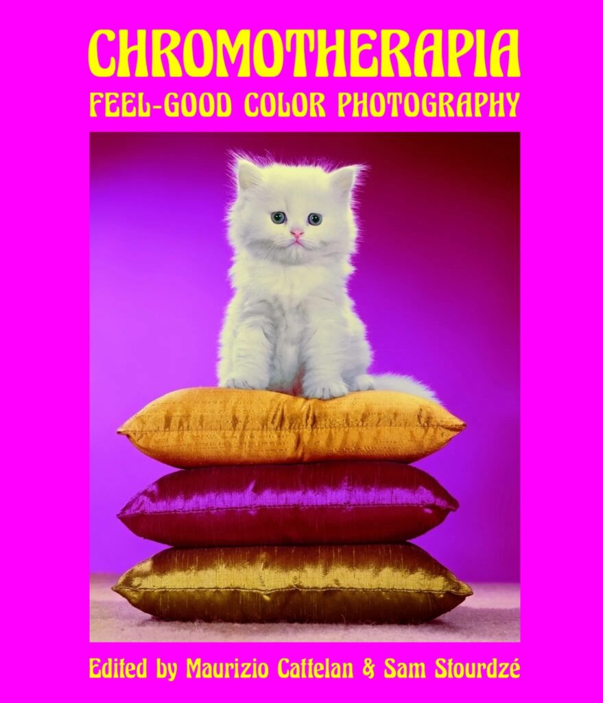 Book cover for "Chromotherapia: Feel-Good Color Photography" which features a white kitten sitting on three silk pillows against a pink background.